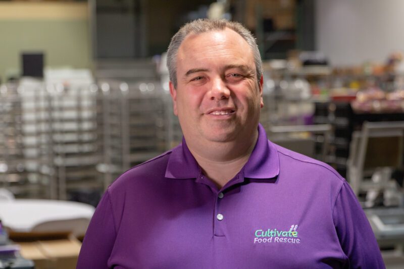 Jim Conklin poses for a photo at Cultivate Food Rescue
