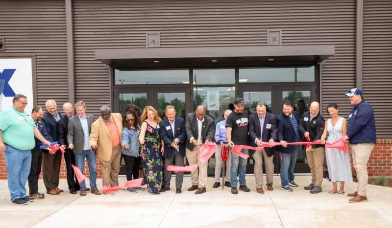 Community Leaders cut the red ribbon in front of the Icebox in South Bend