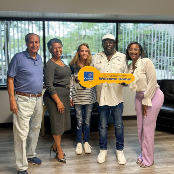 A homeowner celebrates closing on a new family home